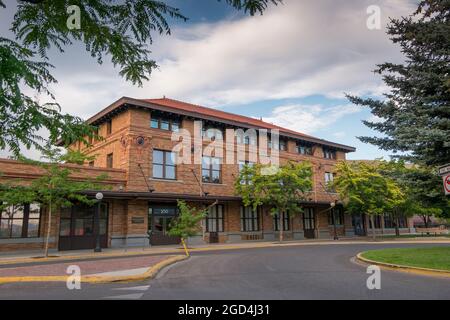 The front facade of the old, brown brick train station, depot for Northern Pacific railroad. In Missoula, Montana. Stock Photo