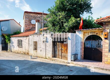 Urla, Turkey - June, 2021: Traditional Aegean stone houses and buildings in Urla province of Izmir, Turkey. Stock Photo