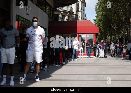 Paris, France. 11th Aug, 2021. People queue to buy a jersey of PSG's Argentinian football player Lionel Messi at the Paris-Saint-Germain (PSG) football club store on the Champs Elysees avenue in Paris on August 11, 2021. Messi signed on August 10, 2021 a two-year deal with PSG with the option of an additional year. The 34-year-old will wear the number 30 in Paris, the number he had when he began his professional career at Barca. Photo by Raphael Lafargue/ABACAPRESS.COM Credit: Abaca Press/Alamy Live News