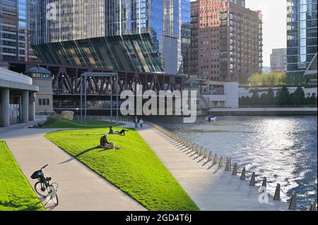 The Riverwalk provides awesome views of the architectural skyline along the Chicago river, Chicago IL Stock Photo