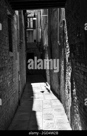 narrow street view of a dead end somewhere in venice apart mass tourism in summer 2020 Stock Photo