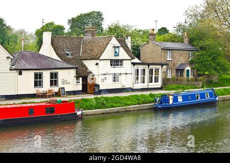 Cambridge, England, UK - May 5, 2012: Two houseboats on river Cam alongside the popular pub Fort Saint George. Stock Photo