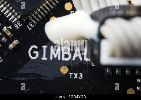Super macro close up of gimbal area on an electronic drone circuit board. Modern technology and components, these drive a camera stabilization device. Stock Photo