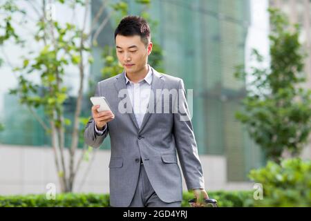 Businessman with mobile phone Stock Photo