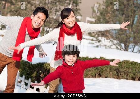 Cheerful family celebrating Chinese New Year Stock Photo