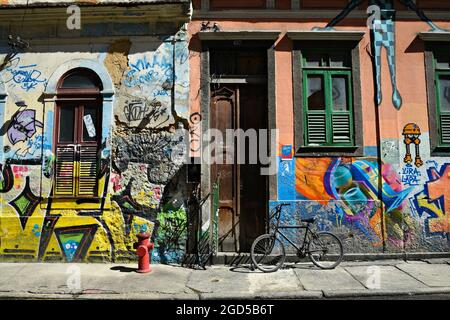Old abandoned building with graffiti on the walls in Santa Teresa, Rio de Janeiro, Brazil. Stock Photo