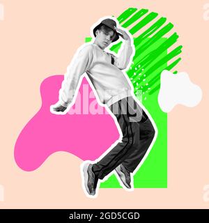One young bw man in casual clothes and hat dancing over bright splashes on pastel background. Minimal design Stock Photo