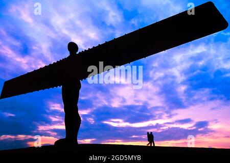 Visitors at the Angel of the North statue, Gateshead, Tyne and Wear, England, UK Stock Photo