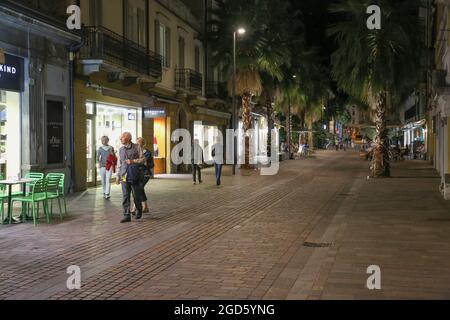 Strolling after dark in Riva del Garda,Italy Stock Photo