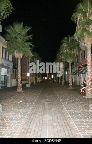 Strolling after dark in Riva del Garda,Italy Stock Photo