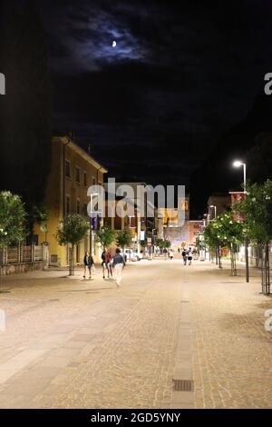 Strolling after dark in Riva del Garda,Italy Stock Photo