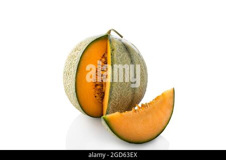 Melon. Whole and a slice of melon on a white background. cut melon, melon slice Stock Photo