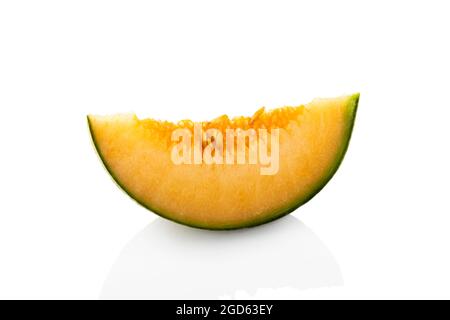 Melon slice. A slice of melon on a white background. melon Stock Photo