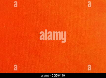 Full frame image of texture bright orange velvet with copyspace Stock Photo