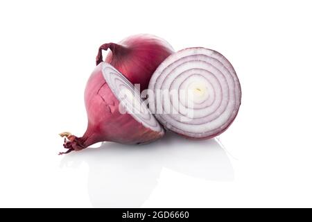 onion, Sliced red onions. Two half one whole onion on white background Stock Photo