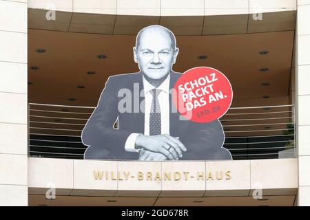 Berlin, Germany, August 7, 2021, election campaign poster at Willy Brandt House, with the slogan: 'Scholz tackles this' Stock Photo