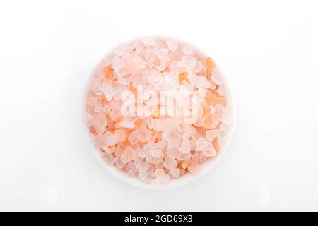 Himalayan salt, pink himalayan salt. himalayan salt in white bowl,  on white background Stock Photo