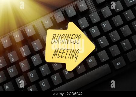 Hand writing sign Business Meeting. Conceptual photo gathering of two or more showing to discuss business ideas Online Browsing And Exploring Stock Photo