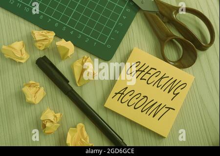 Hand writing sign Checking Account. Word for bank account that allows you easy access to your money Multiple Assorted Collection Office Stationery