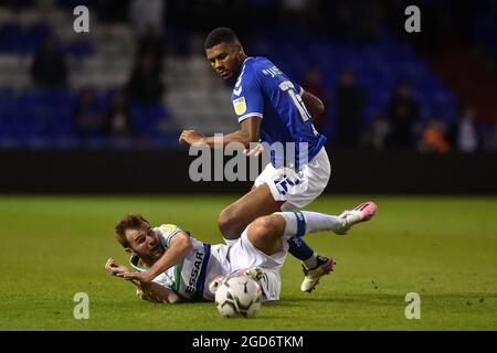OLDHAM, UK. AUG 10TH Oldham Athletic's Kyle Jameson tussles with Callum McManaman of Tranmere Rovers during the Carabao Cup match between Oldham Athletic and Tranmere Rovers at Boundary Park, Oldham on Tuesday 10th August 2021. (Credit: Eddie Garvey | MI News) Credit: MI News & Sport /Alamy Live News Stock Photo