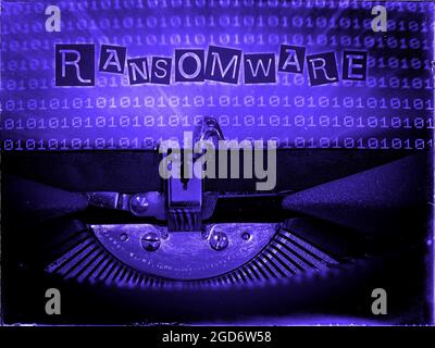 Ransomware, Mechanical Typewriter, Binary code background, Blue tone, Vintage distorted look, Ransom note typography Stock Photo