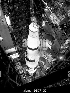 Looking down on the massive Saturn V rocket inside its assembly building Stock Photo