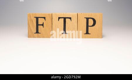 FTP was created from wooden cubes. News and journalism concepts. close up. Stock Photo