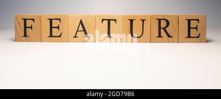 Feature was created from wooden cubes. News and journalism concepts. close up. Stock Photo