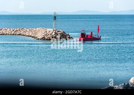 Red Sightseeing Submarine - Starfish Designed similar to a small boat, with the passenger area just a couple of inches under the sea level to observe Stock Photo
