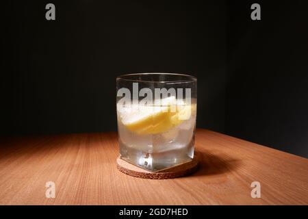 Home made Gin and Tonic with lemon slices Stock Photo