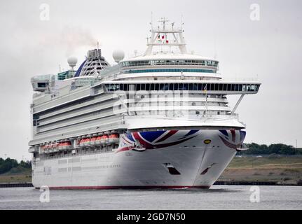 AJAXNETPHOTO. JULY, 2021. NORTH SHIELDS, ENGLAND. - OUTWARD BOUND- THE 115,055 GROSS TON CARNIVAL CRUISE LINE SHIP AZURA OPERATED BY P&O CRUISES OUTWARD BOUND FROM THE RIVER TYNE AFTER BEING LAID-UP ALONGSIDE THE INTERNATIONAL PASSENGER TERMINAL DURING THE COVID PANDEMIC. VESSEL WAS BUILT BY ITALIAN YARD FINCANTIERI AT MONFALCONE IN 2010.PHOTO:TONY HOLLAND/AJAX REF:DTH212707 38925 Stock Photo