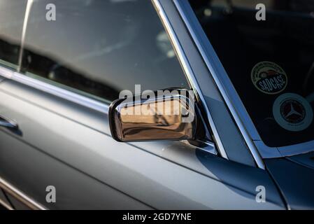 Side mirror of a polished up classic car. Stock Photo
