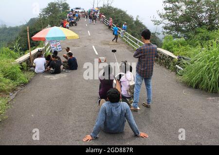 KEDIRI, INDONESIA - March 25, 2016: Tourists enjoying the scenery at the Mount Kelud tourist site Stock Photo