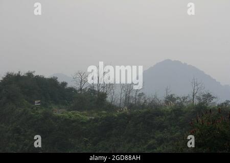 KEDIRI, INDONESIA - March 25, 2016: Tourists enjoying the scenery at the Mount Kelud tourist site Stock Photo