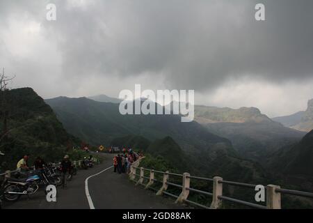 KEDIRI, INDONESIA - March 25, 2016: Tourists enjoying the scenery at the Mount Kelud tourist site Stock Photo