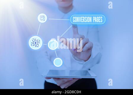 Conceptual caption Conversion Pages. Business concept appears in response to clicking on a search engine Lady Holding Tablet Pressing On Virtual Stock Photo