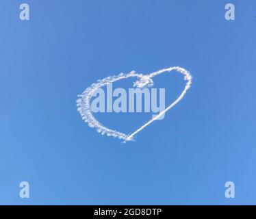 heart shaped cloud in the blue sky Stock Photo