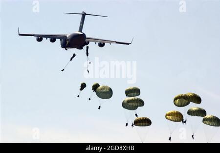 US 82nd Airborne Division soldiers walking during the Invasion of ...