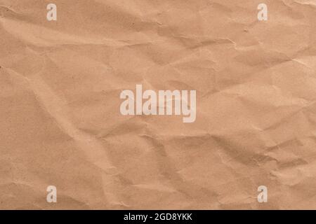 Old wrinkled brown wrapping paper. Abstract background Stock Photo
