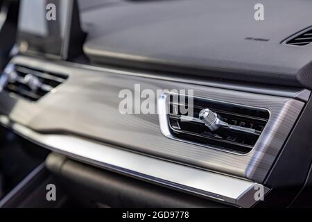 interior air duct on the front panel of a premium car Stock Photo