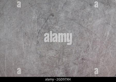scratched real life old aluminuim flat sheet texture and full frame background. Stock Photo