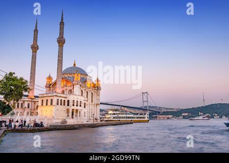 August 2nd 2021 Istanbul, Turkey Beautiful evening panorama of Ortakoy Mosque, the Bosporos Straight, Istanbul, Turkey Stock Photo