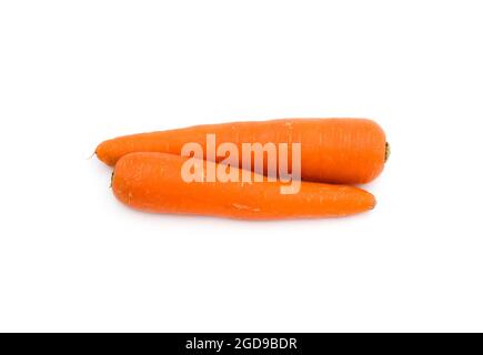 Two fresh ripe carrots on an isolated white background close up Stock Photo