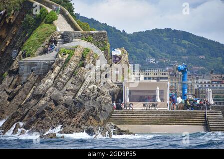 San Sebastian, Spain - 2 August 2021: Dock on Isla Santa Clara in the La Conca Bay Stock Photo