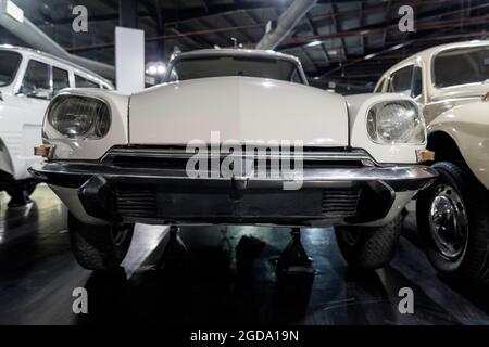 '7/31/2021 - Sharjah, UAE: 1973 Citroen D Special a French classic white antique car front end. Stock Photo