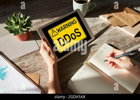 DDoS attack detection message. Virus and Hacking. Cyber security and internet concept. Stock Photo