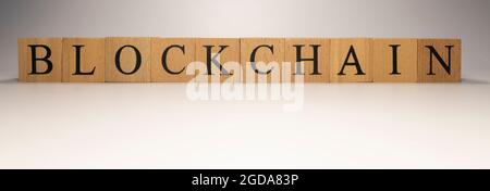 Blockchain chain was created from wooden cubes. Industry and technology. close up. Stock Photo