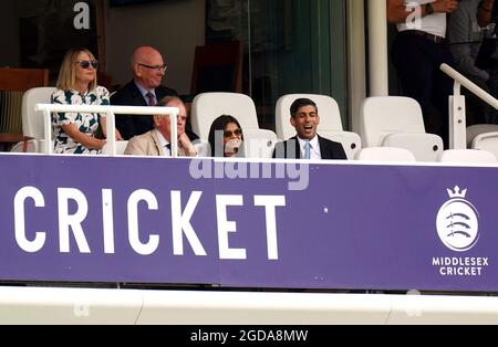 Chancellor of the Exchequer Rishi Sunak (front right) alongside his wife Akshata Murthy in the stands during day one of the cinch Second Test match at Lord's, London. Picture date: Thursday August 12, 2021. Stock Photo
