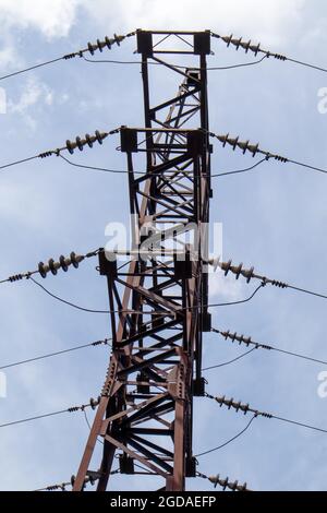 High voltage pylons on a sunny meadow in bavaria Stock Photo - Alamy