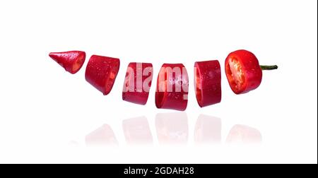 flying red pepper on white background Stock Photo
